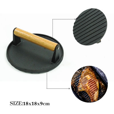 黒いBBQは前に出版物が付いている鋳鉄のグリドル鍋51*26cmに味をつけた